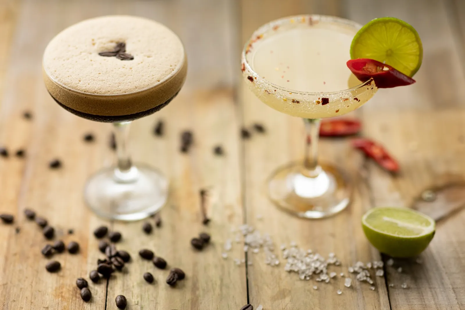 Two cocktails on a timber table